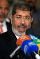 محمد مرسي يعلن عن تعديل وزاري قريب 