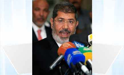 محمد مرسي يعلن عن تعديل وزاري قريب 