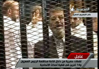 أنصار مرسي يتظاهرون أمام أكاديمية الشرطة أثناء محاكمته