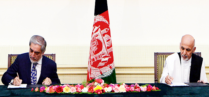 المتنافسان في الانتخابات الأفغانية يتفقان على حكومة وحدة وطنية 