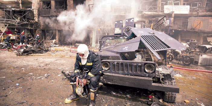  @ جانب من آثار التفجير الانتحاري الذي وقع في بغداد.