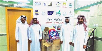هيئة المهندسين السعودية بنجران تقدم هدايا لجمعية شمعة أمل 