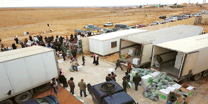  الفريق الإغاثي يوزع المساعدات على اللاجئين السوريين