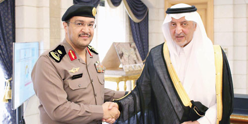   الأمير خالد الفيصل يقلد الحارثي رتبة لواء