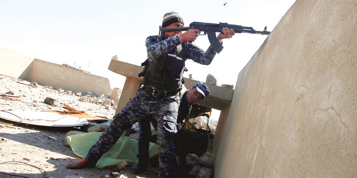  القوات العراقية أثناء الاشتباك مع عناصر داعش