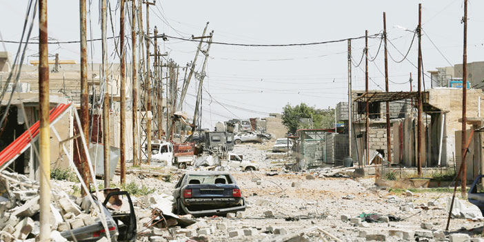  مدينة الموصل وقد حل بها الدمار من جراء القتال الدائر بين القوات العراقية وداعش