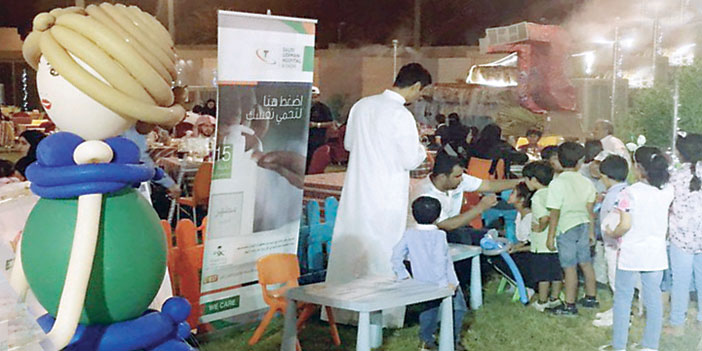  المستشفى السعودي الألماني خلال مشاركته بالخيمة الرمضانية بمداريم كراون