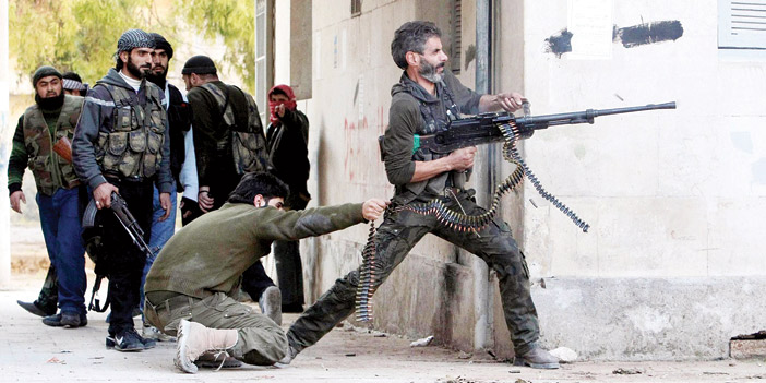  مقاتلو المعارضة السورية أثناء الاشتباك العنيف مع قوات الأسد