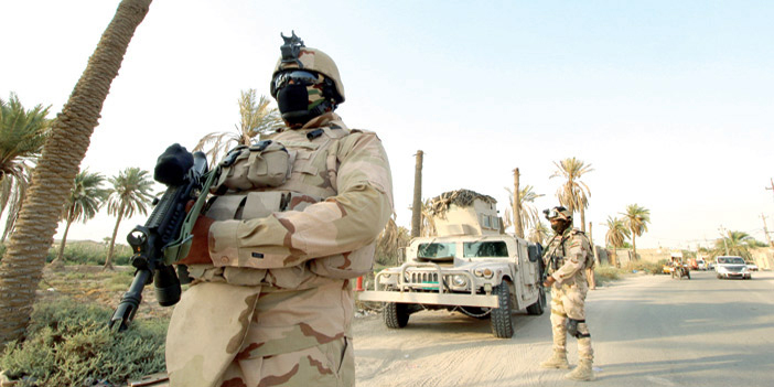  أحد أفراد القوات العراقية التي تتصدى لداعش في شمال العراق