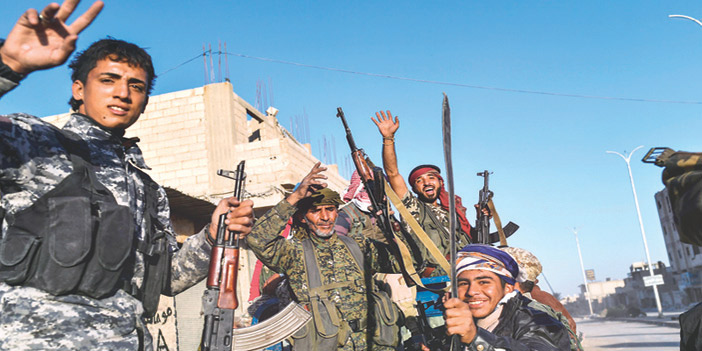  احتفال عناصر من قوات سوريا الديمقراطية بطرد تنظيم داعش من الرقة