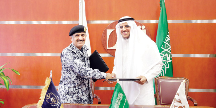  الأمير فيصل المشاري و الخليوي خلال توقيع مذكرة التفاهم