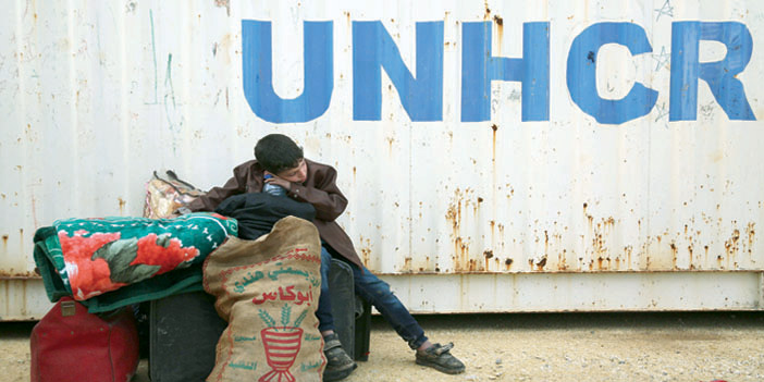  أحد السوريين النازحين من مناطق الصراع في أحد معسكرات الترحيل التابعة للأمم المتحدة