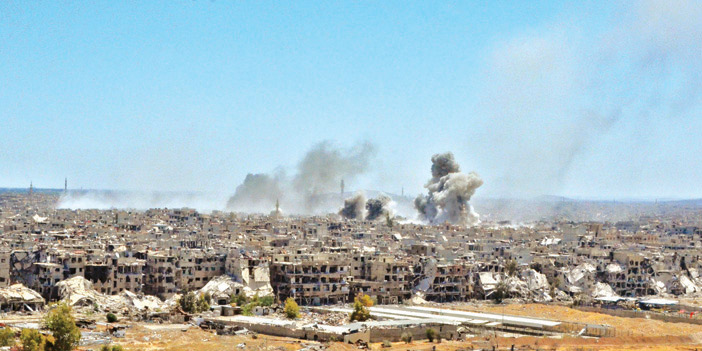  أدخنة تتصاعد من البنايات في جنوب دمشق إثر هجمات النظام السوري والروسي
