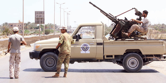  مجموعة من المسلحين ينتمون إلى الجماعات الليبية المتناحرة