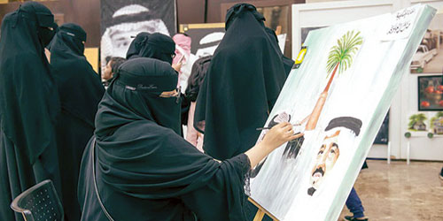  فتاة سعودية ترسم خادم الحرمين الشريفين