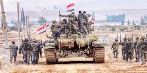  قوات النظام السوري أثناء دخولها مدينة منبج السورية