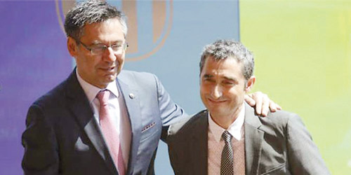  مدرب الفريق ارنستو فالفيردي و رئيس نادي برشلونة