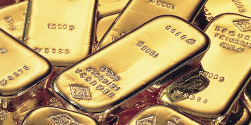 الذهب يتجاوز 1450 دولارًا أمريكيًّا للأوقية قبل تراجعه 