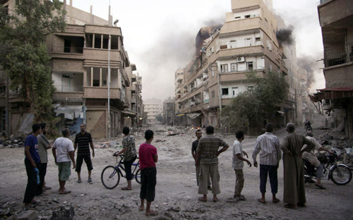 المعارضة السورية تتهم النظام في دمشق بقصف مخيم اليرموك بالكيماوي 