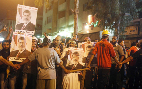 آشتون التقت مرسي وعرضت عليه مبادرة لإطلاق سراحه ووقف العنف 