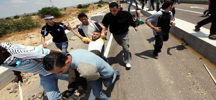 إصابة مصور تلفزيون فلسطين برصاص قوات الاحتلال في مسيرة كفر قدوم 
