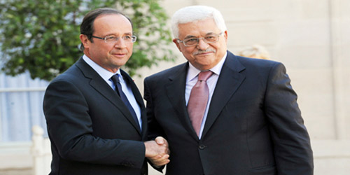  الرئيس محمود عباس أثناء لقاء الرئيس الفرنسي فرانسوا هولاند