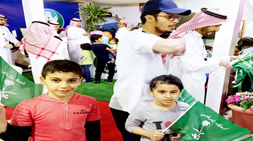  جانب من توزيع الأعلام