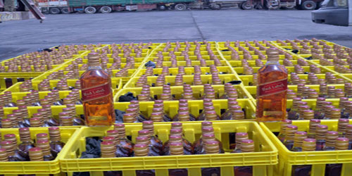 شحنتا فواكه تحمل 23.400 زجاجة خمر 