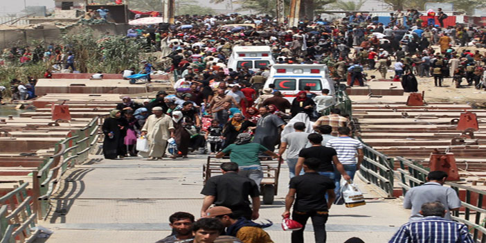  سكان الرمادي النازحون بعد الاشتباكات بين داعش و قوات الأمن العراقية