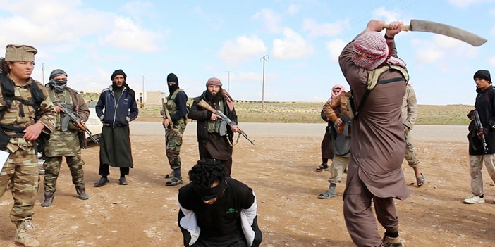  تنظيم داعش في سوريا يعدم شباناً في منطقة الميادين