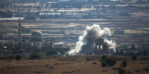  آثار الاشباكات بين قوات الأسد والمعارضة