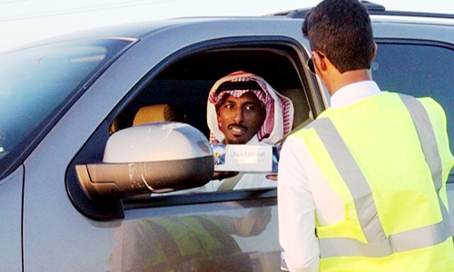  من توزيع وجبات الإفطار على قائدي المركبات