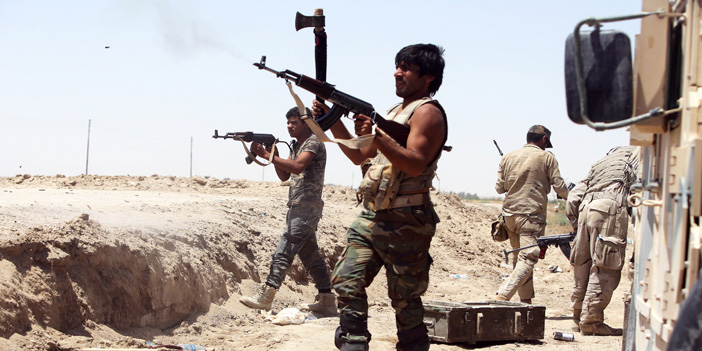 مقاتلو الحشد الشعبي يدعمون القوات العراقية