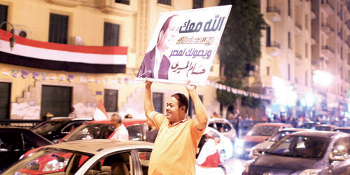  الفرحة تعم أفراد الشعب المصري بافتتاح قناة السويس الجديدة