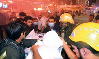 الدفاع المدني: إخلاء 1028حاجاً آسيوياً بأحد فنادق العاصمة المقدسة جراء حادث حريق 