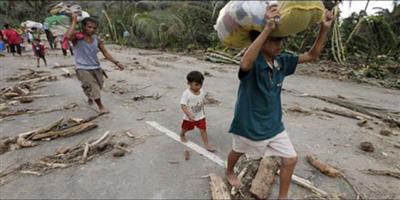 ارتفاع حصيلة الضحايا الى 22 قتيلا وتحذيرات بحدوث مزيد من الفيضانات في الفلبين 
