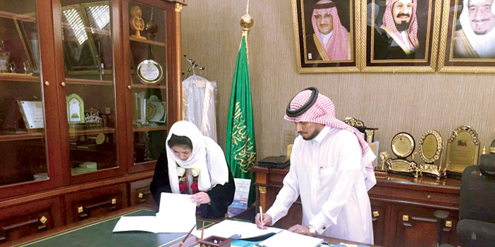  جانب من توقيع الاتفاقية