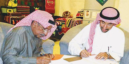  جانب من توقيع الاتفاقية