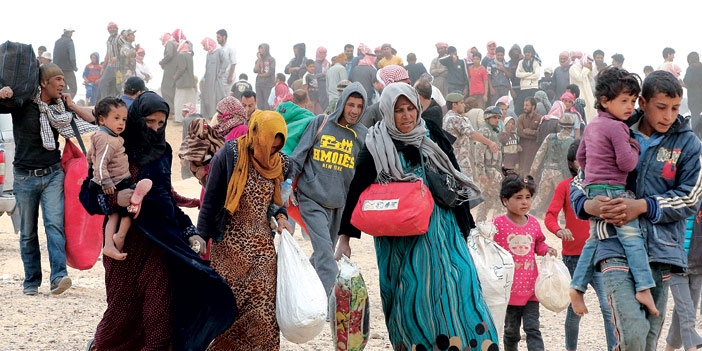  مئات اللاجئين السوريين على الحدود الأردنية هرباً من القتال قرب حلب