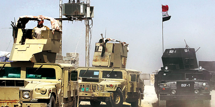   آليات الجيش العراقي تحاصر الفلوجة