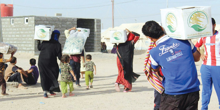  توزيع 315 طناً من المساعدات للأشقاء في العراق
