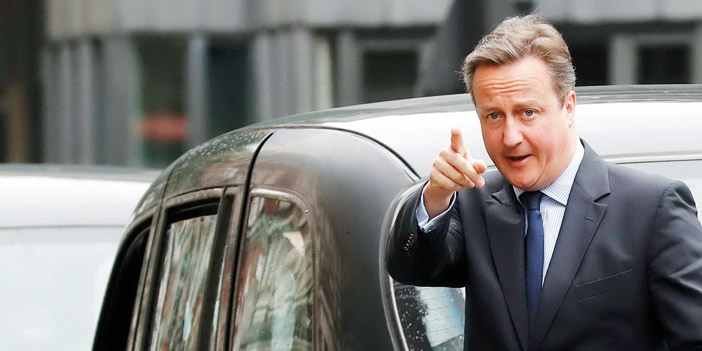   رئيس الوزراء البريطاني أثناء حضوره لمكتب الاقتراع