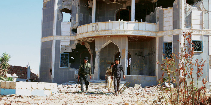  مقاتلون من الجيش السوري الحر في إحدى معاركهم مع قوات النظام