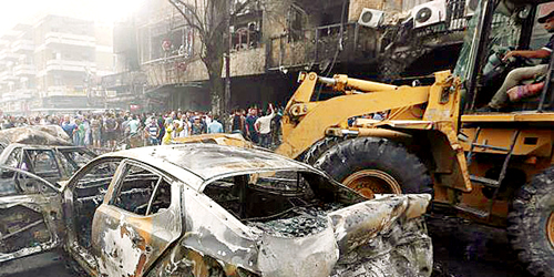  سيارة مدمرة إثر التفجير الانتحاري الذي استهدف بغداد