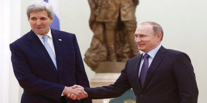   الرئيس الروسي بوتين وجون كيري في لقاء سابق
