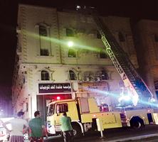 إنقاذ 32 شخصاً من حريق بمبنى سكني 
