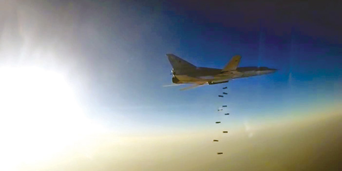  القاذفة الروسية (تو-22 إم3) خلال قصف مواقع لتنظيمي داعش والنصرة بعد انطلاقها من إيران