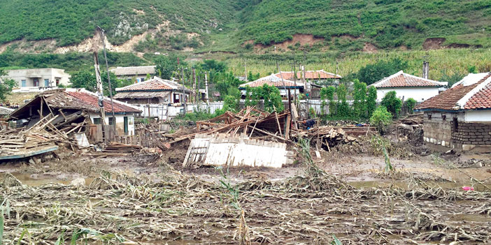  آثار الفيضانات التي ضربت كوريا الشمالية