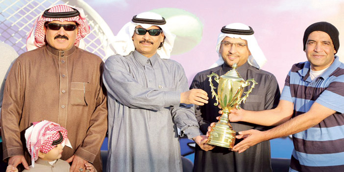  الزارع والفويهي أثناء تكريم الحجاج