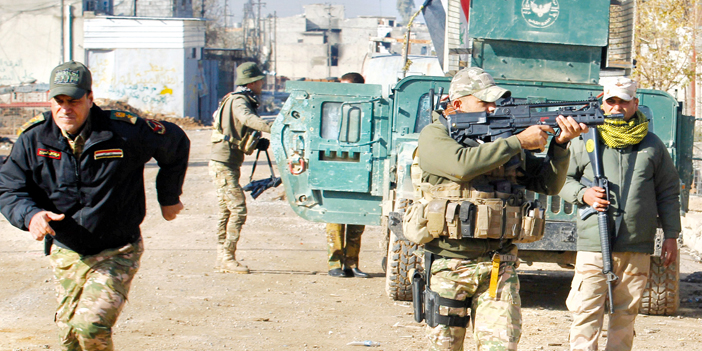  عناصر من القوات العراقية بالموصل